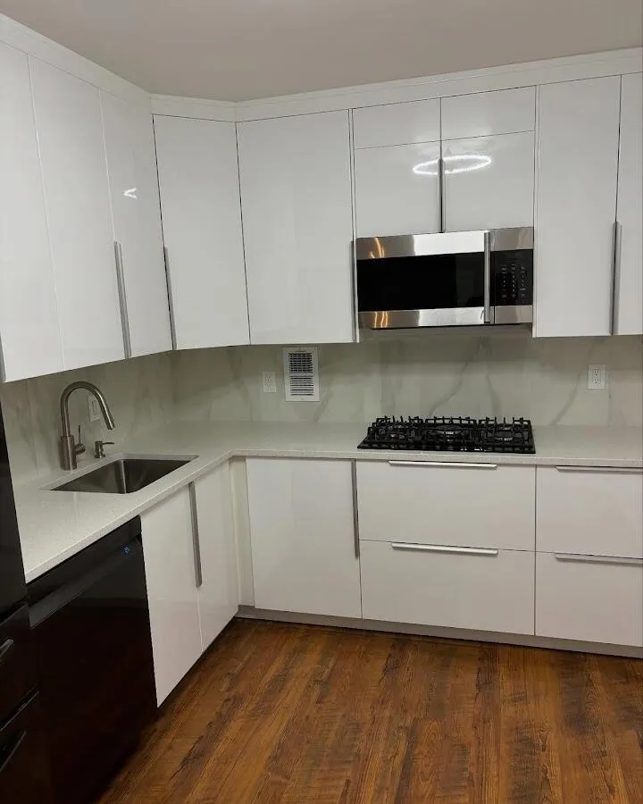 Restored kitchen with white cabinets after water damage in Berkeley Heights